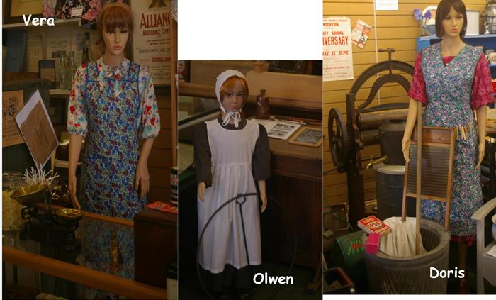 3 mannequins - child in Edwardian dress and two female adults in 1950s domestic dress